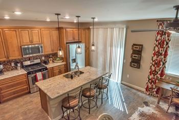 Luxury vinyl wood plank look flooring throughout